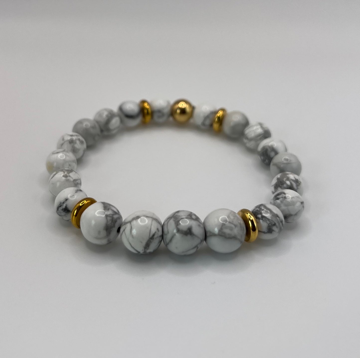 Howlite Crystal Bead with gold color spacers Bracelet